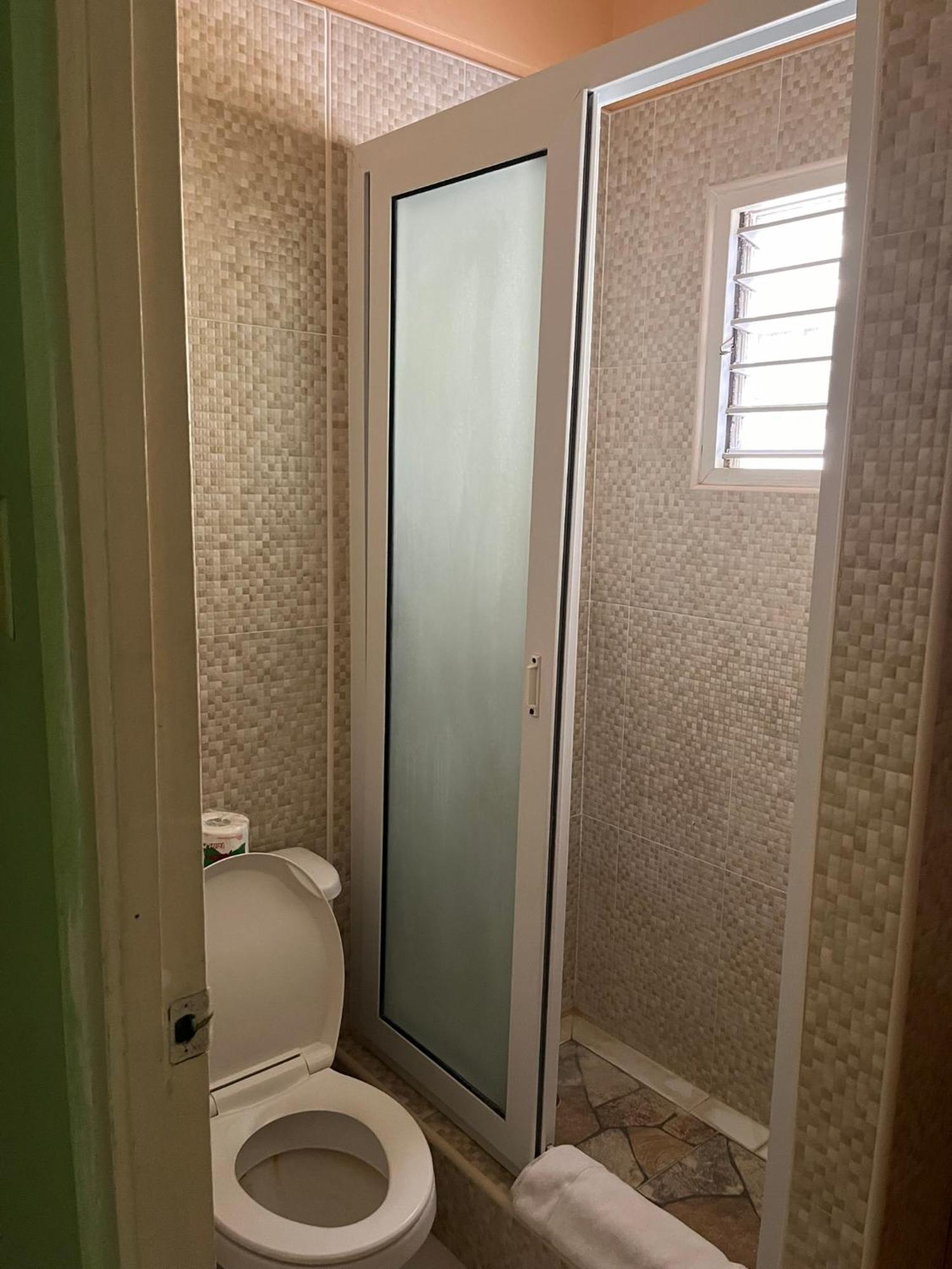Andre'S Guest House نيغريل الغرفة الصورة